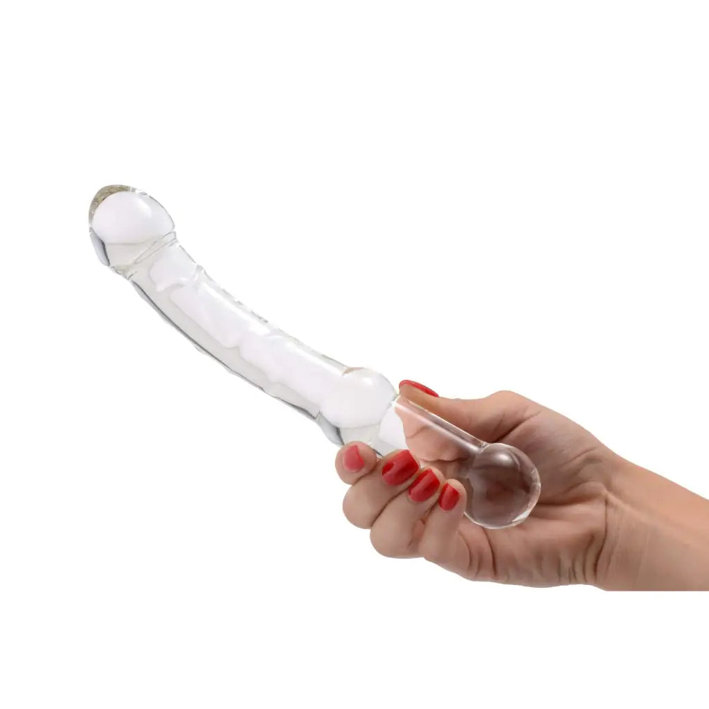 Hand holding Prana Thrusting Wand glass pipe on white background