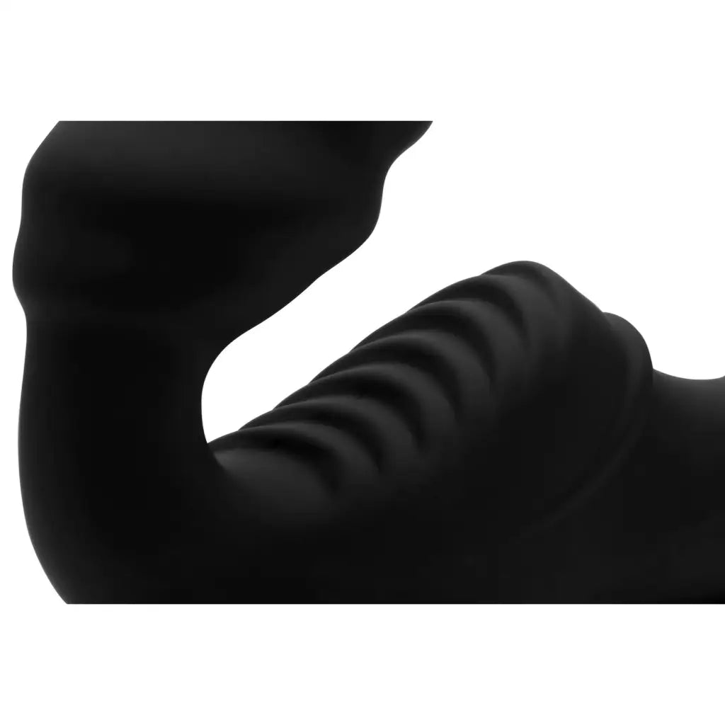 Silhouette of neck and shoulder using Pro Rider 9x Vibrating Strapless Strap On with Remote Control