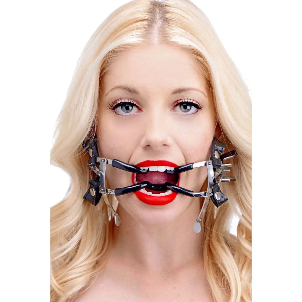 A woman wearing a Ratchet Style Jennings Mouth Gag with Strap for secure mouth restraint