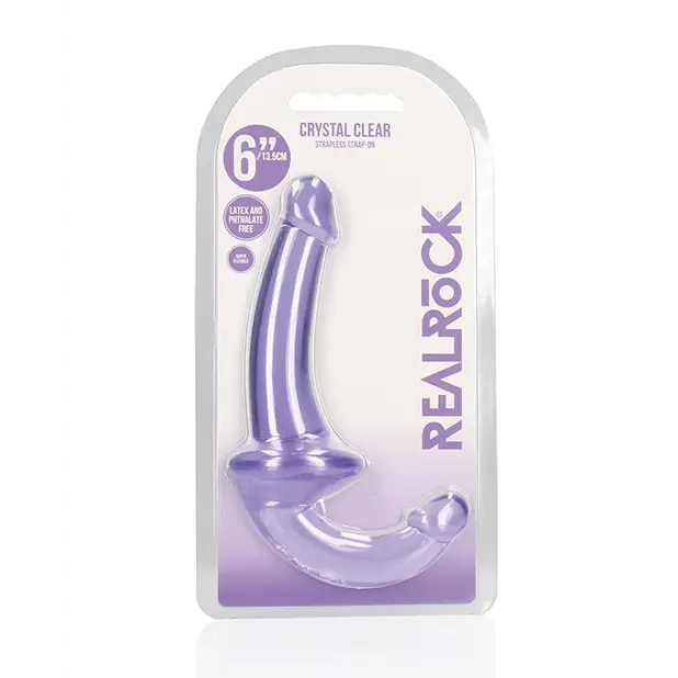 Close up of purple RealRock Crystal Clear strapless strap-on dildo with clear plastic cover