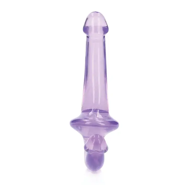 A purple glass bong with a white background displaying the RealRock Crystal Clear Strapless Strap-On