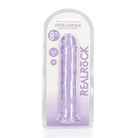 Close-up of purple RealRock Crystal Clear Straight 7 in. Dildo Without Balls in packaging