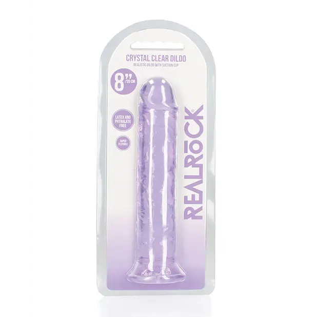 Close-up of purple RealRock Crystal Clear Straight 7 in. Dildo Without Balls in packaging