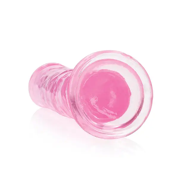 Product image: A RealRock Crystal Clear pink glass plug with a hole in the middle for versatile use