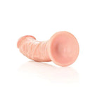 Shots America Dildos Flesh RealRock Realistic 7 in. Curved Dildo With Suction Cup Beige at the Haus of Shag