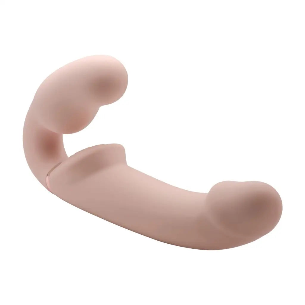 Curved flesh-colored silicone ergo fit strapless strap-on with remote control function