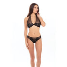 Woman wearing Rene Rofe Midnight Halter Set Black lace bikini set