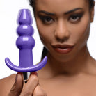 Frisky Powered Plug Purple Ribbed Vibrating Butt Plug at the Haus of Shag