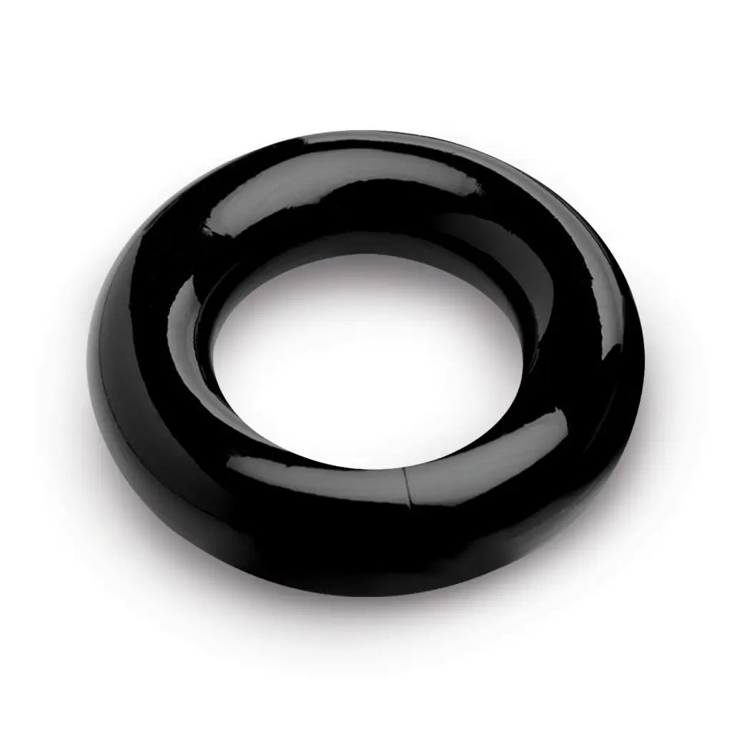 Black glossy circular ring from the Ring Master Custom Ball Stretcher Kit with a polished finish