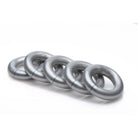 Five silver O-rings for the Ring Master Custom Ball Stretcher Kit aligned in a row