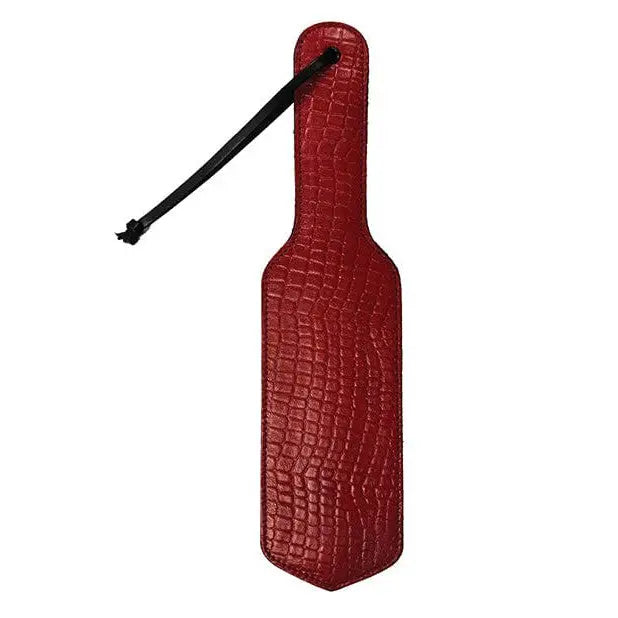 Rouge plain leather paddle with crocodile texture, black handle, perfect for intense play