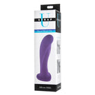 A close-up of a purple Royal Heart on silicone harness dildo in its packaging