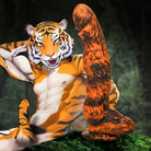 Anthropomorphic tiger posing with Sabretooth Silicone Dildo, ideal for water based lubricants