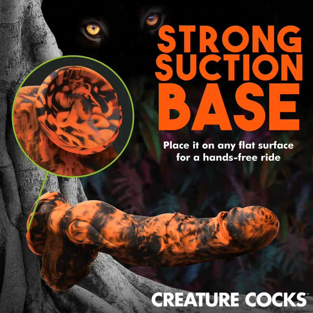 Sabretooth silicone dildo in orange-black, premium suction cup base, use with water based lubricants