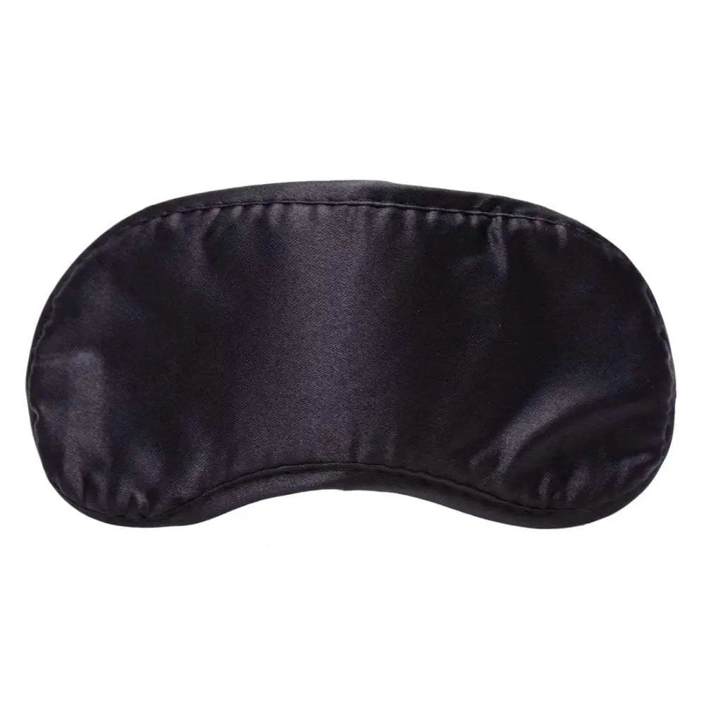 Sleek black silk sleep mask displayed in luxurious satin blindfold product