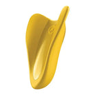 A Satisfyer High Fly Finger Vibrator displayed with a yellow toothbrush for optimal hygiene