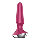 Close up of Satisfyer Plug Illicious 2 pink sex toy with metal spoon