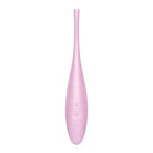 Close up of a pink Satisfyer Twirling Joy toothbrush with a white background