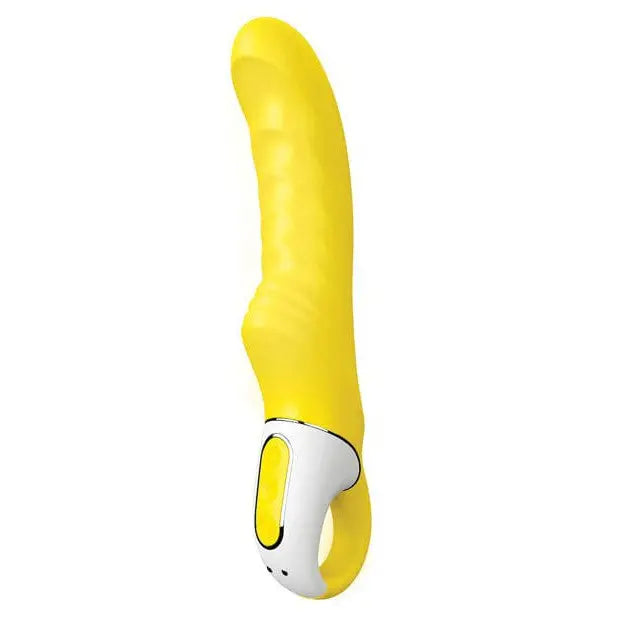 Satisfyer Vibes Yummy Sunshine device, banana-shaped, attached to a wall