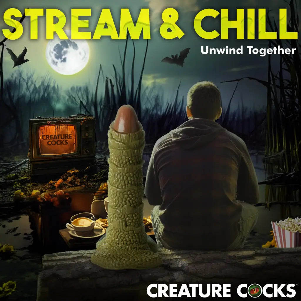 Green knitted penis-shaped object with suction cup base - Scaly Swamp Monster giant dildo