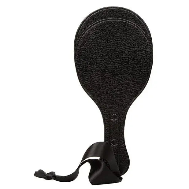 Scandal Round Double Paddle by CalExotics: Black leather paddle with curved handle and ribbon