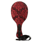 Scandal Round Double Paddle by CalExotics with ornate red and black floral damask pattern