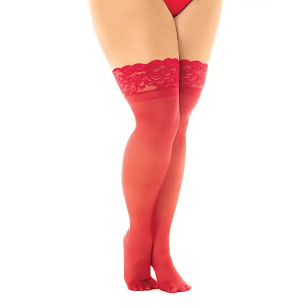 A woman in sheer thigh high stockings with stay up silicone lace top