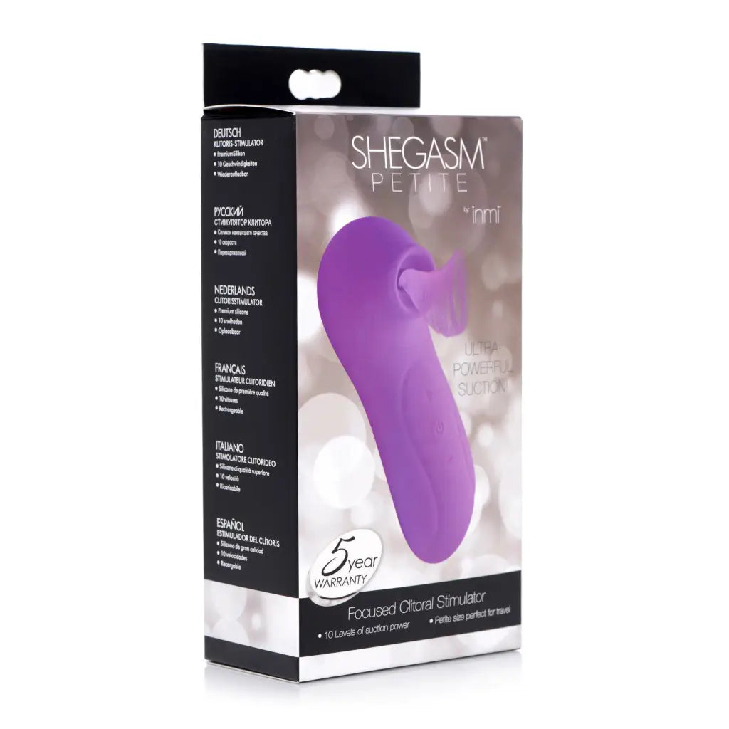 Shegasm Petite Silicone Focused Clitoral Stimulator in packaging - purple silicone device