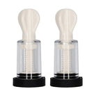 Pair of Shots Electroshock Nipple Suckers with clear cylinders and white bulb tops