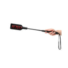 Handheld electronic paddle displaying ’OUCH’ in red from Shots Ouch Ouch Crop Large - Black