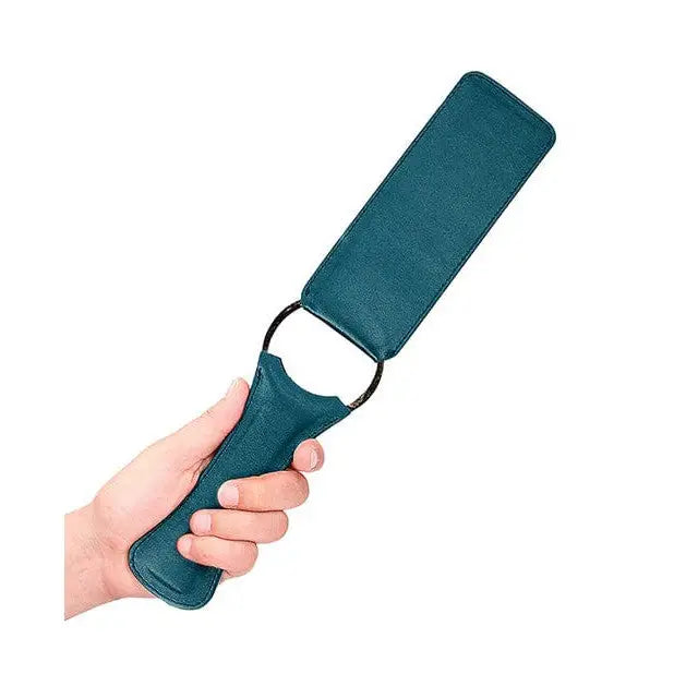 Teal-colored Shots Ouch Halo Paddle with loop handle for impact play enthusiasts