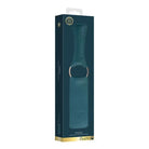 Teal leather Shots Ouch Halo Paddle with metal ring handle in product packaging