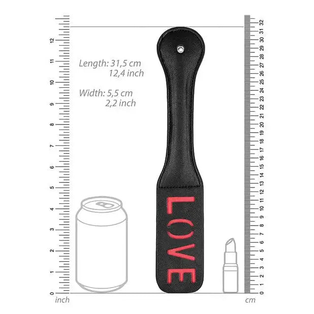 Shots Ouch Love Paddle Black with ’LOVE’ in red, perfect for adding fun to your playtime