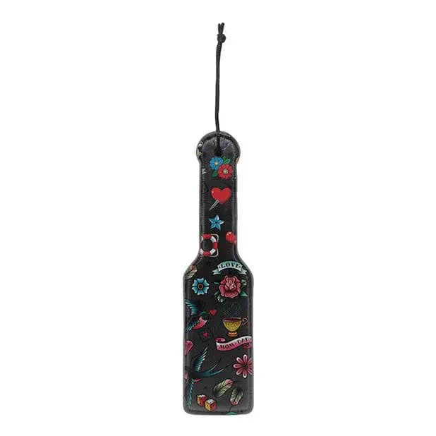 School tattoo style printed paddle with colorful designs and symbols on black background