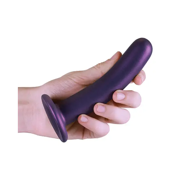 Hand holding purple foam roller with Shots Ouch! Smooth Silicone G-Spot Dildo Metallic Purple