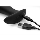 USB cable connected to a black Silicone Prostate Vibrator with Remote Control for men