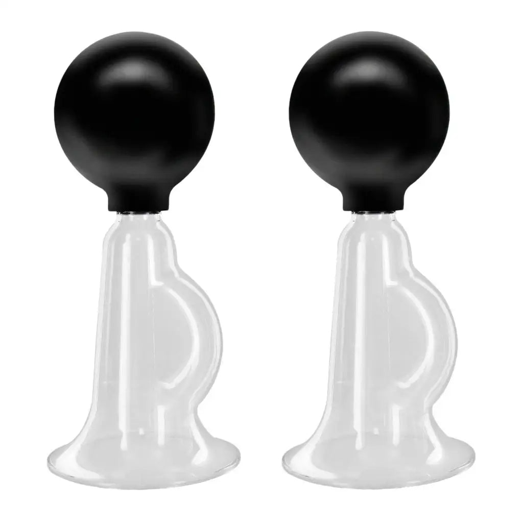 Size Matters Nipple Honkers: Two identical white cupping devices with black spherical tops