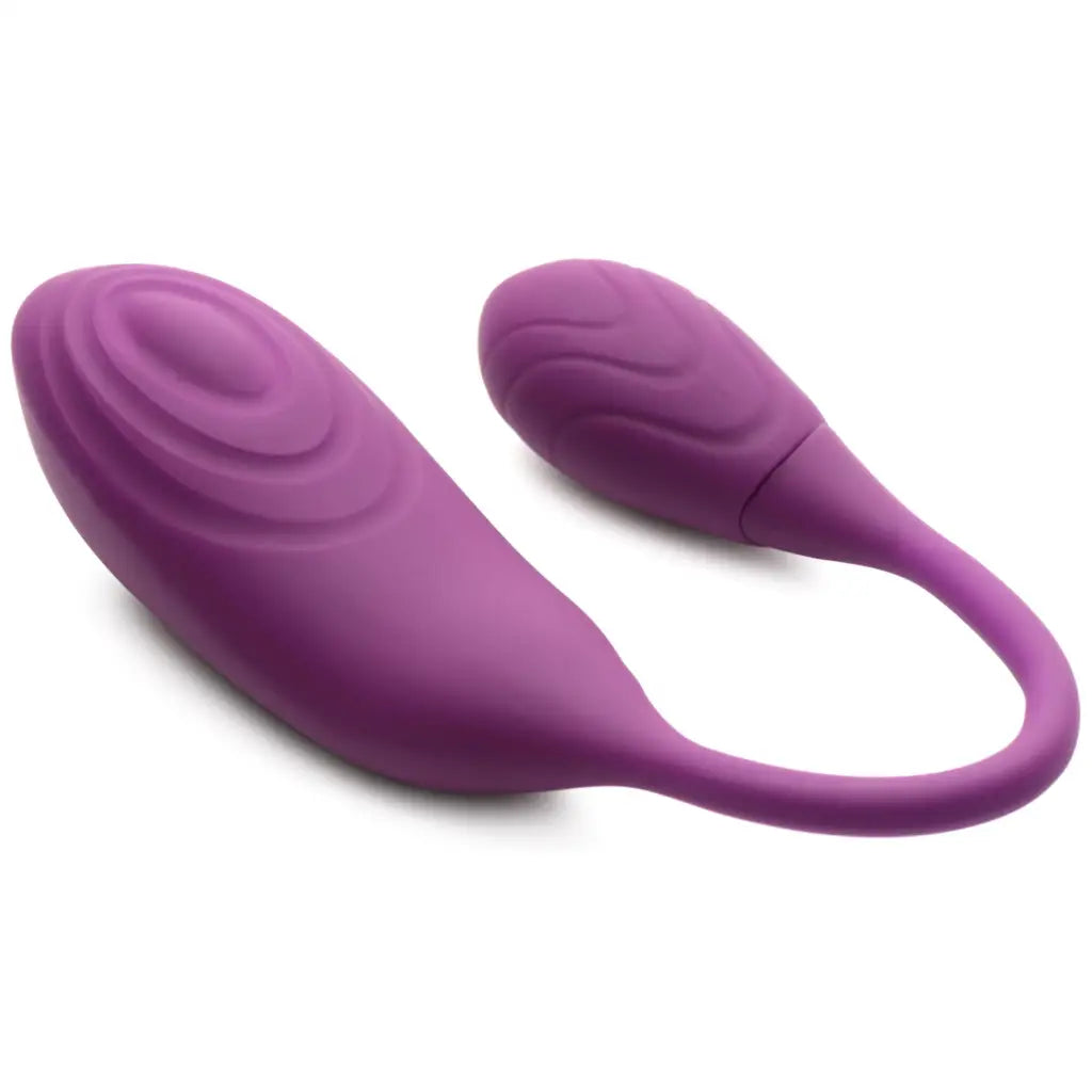 Purple pulsing clit stimulator and vibrating egg for enhanced intimate pleasure