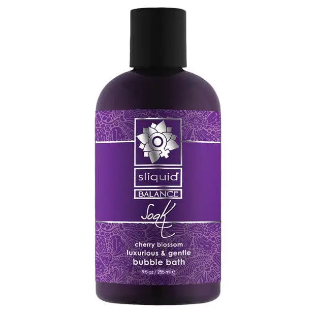 Sliquid Balance Soak bubble bath bottle with purple and white flowers for a luxurious experience