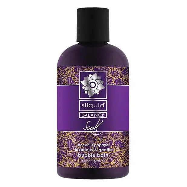 Bottle of Sliquid Balance Soak bubble bath with purple and gold swirl