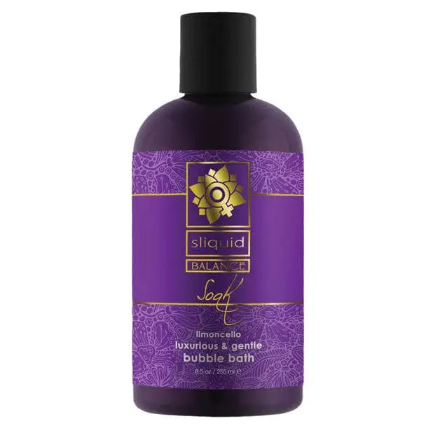 Bottle of Sliquid Balance Soak, a luxurious purple and gold bubble bath solution