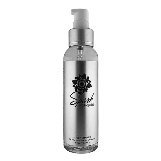 Silver bottle of Sliquid Naturals The Studio Collection Spark Plastic Pump - 4.2 Oz