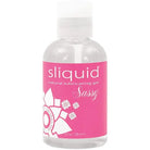 Close up of Sliquid Sassy Water-Based Anal Lubricant bottle with flower on it