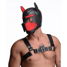 A man wearing the Spike Neoprene Puppy Hood with a red muzzle and leather mask