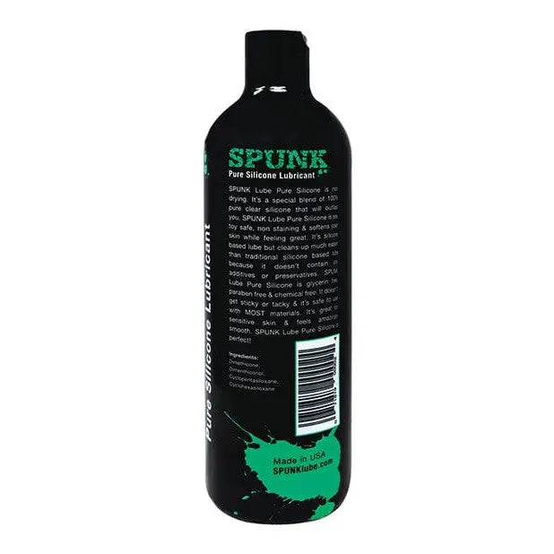 Black bottle of SPUNK Pure Silicone Lube with green text and splash design