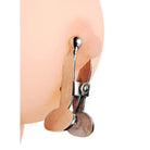 Clip-on earring attached to earlobe from Stainless Steel Ball-tipped Nipple Clamps set