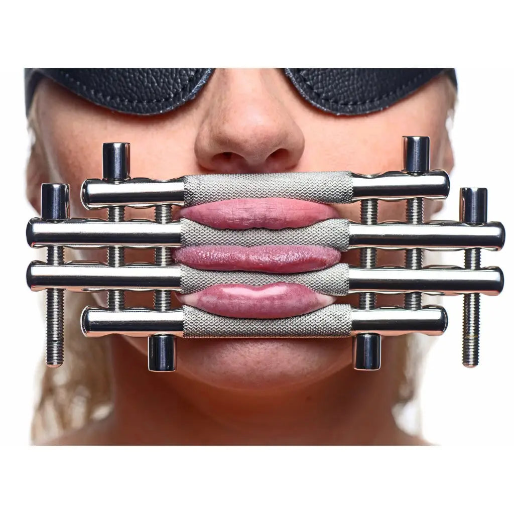 Master Series Leatherr Stainless Steel Lips And Tongue Press at the Haus of Shag