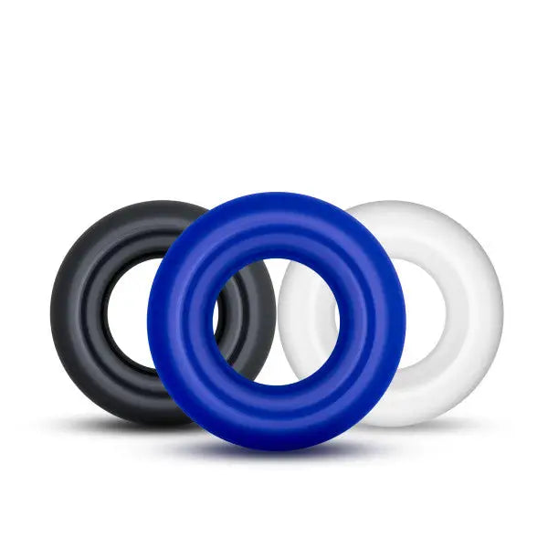 Three colored cock rings from Stay Hard Donut Rings 3 Pack on a white background