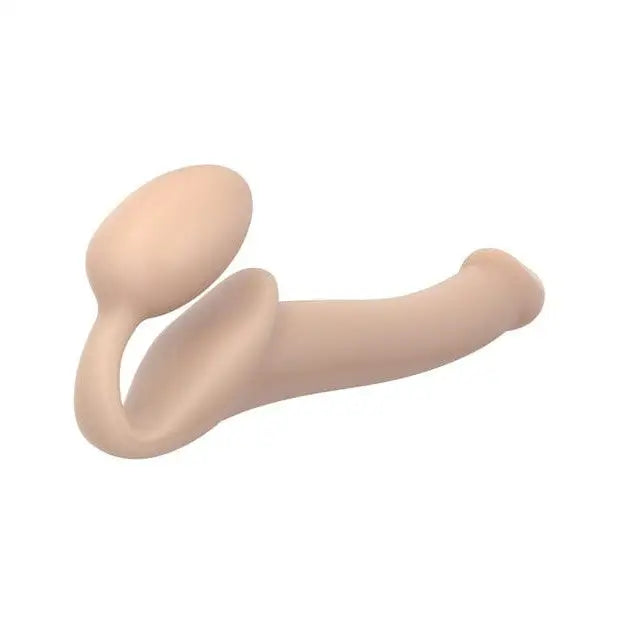 A pair of fleshes with a white background from Strap-On-Me Strapless Silicone Non-Vibrating Strap on