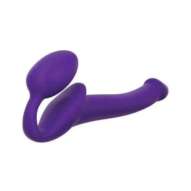 Purple silicone strap-on with a long, curved tail for unparalleled comfort and control